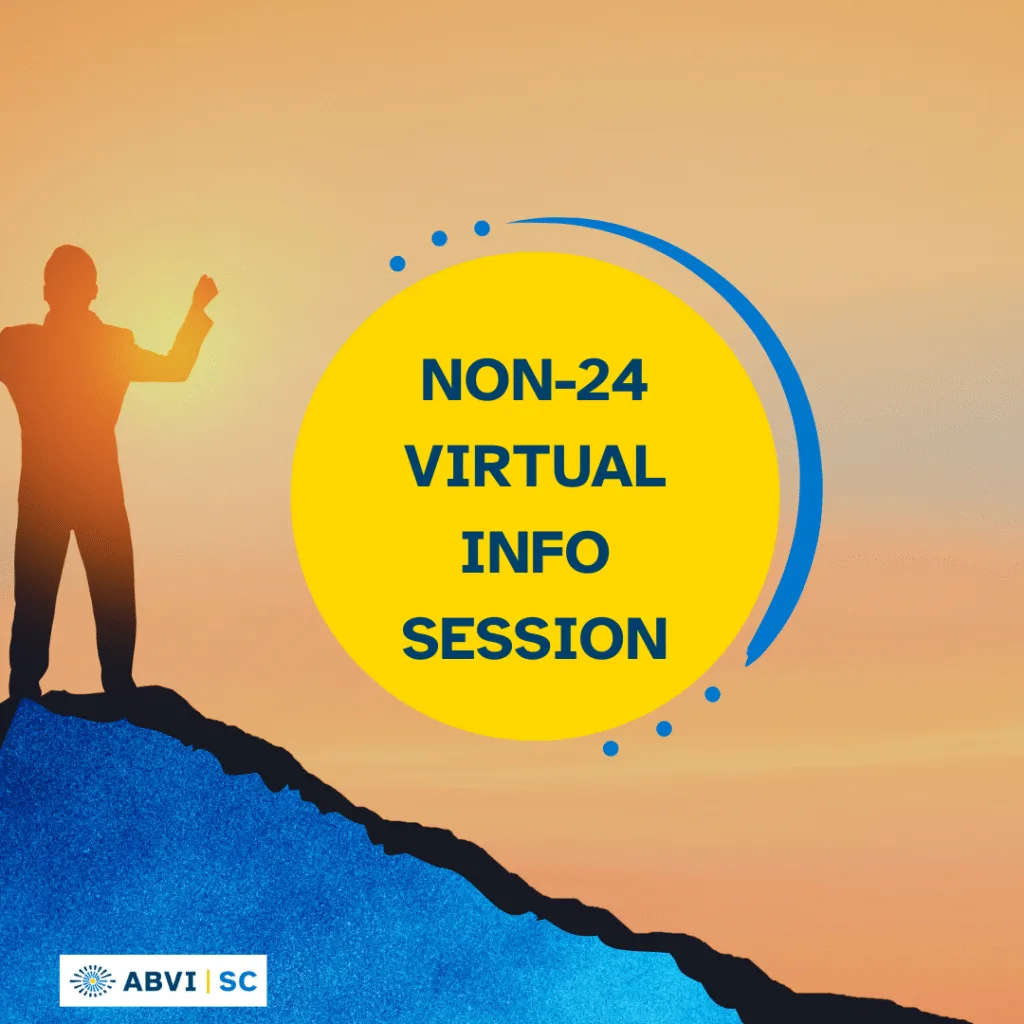 Silhouette of a man standing on a mountaintop at sunrise