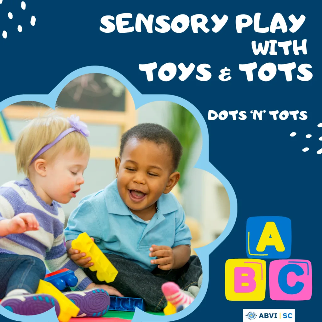 Two young toddlers laugh and play with blocks on the floor